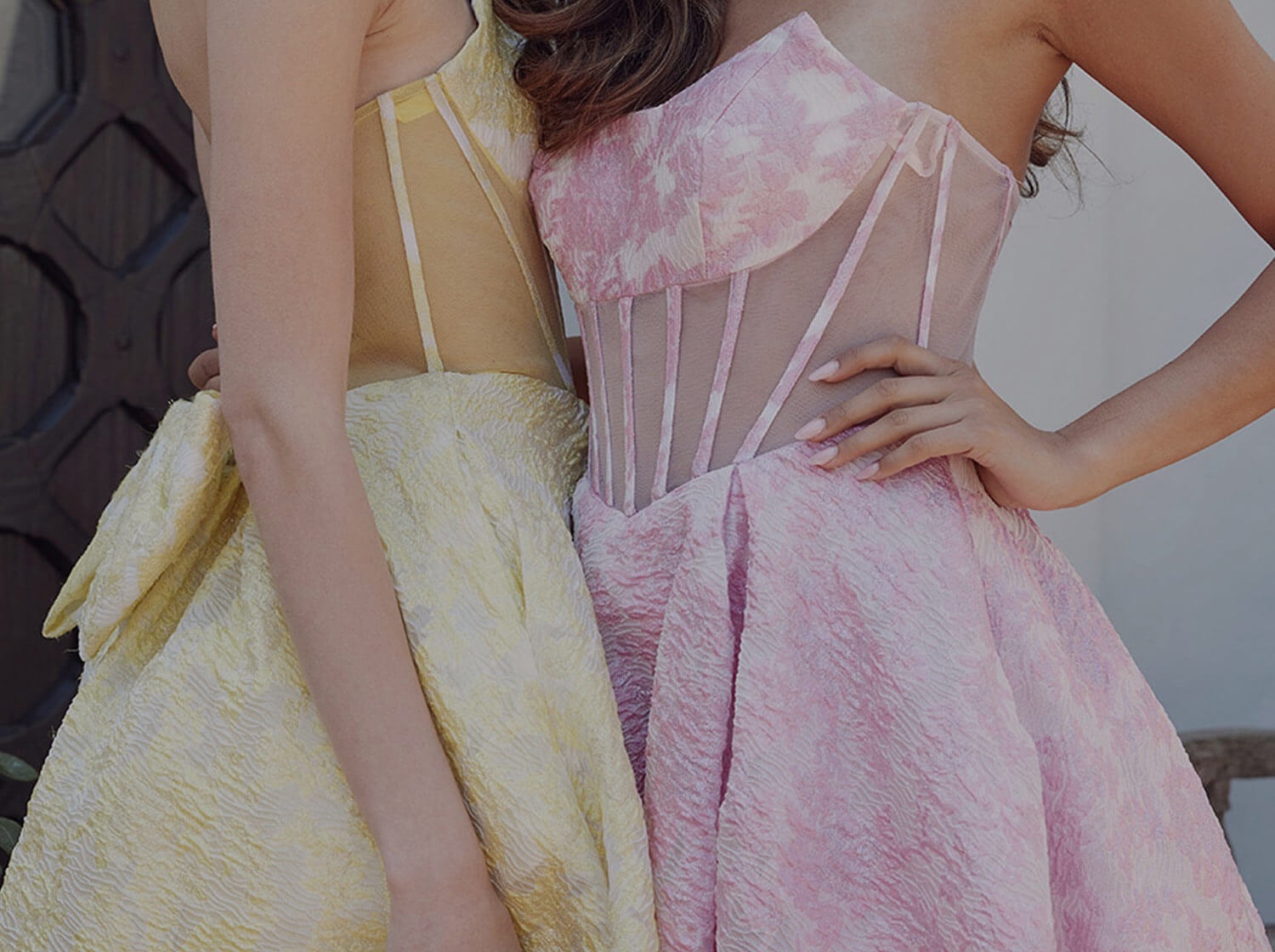 Model wearing a under $249 gown. Mobile image